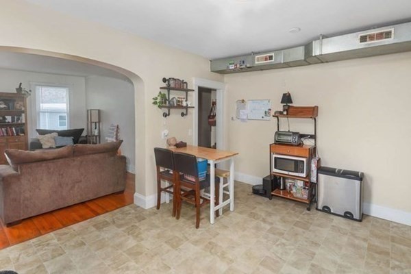 171 Mechanic Street Southbridge, MA 01550 - Photo 7 of 37 a living room with furniture and a flat screen tv