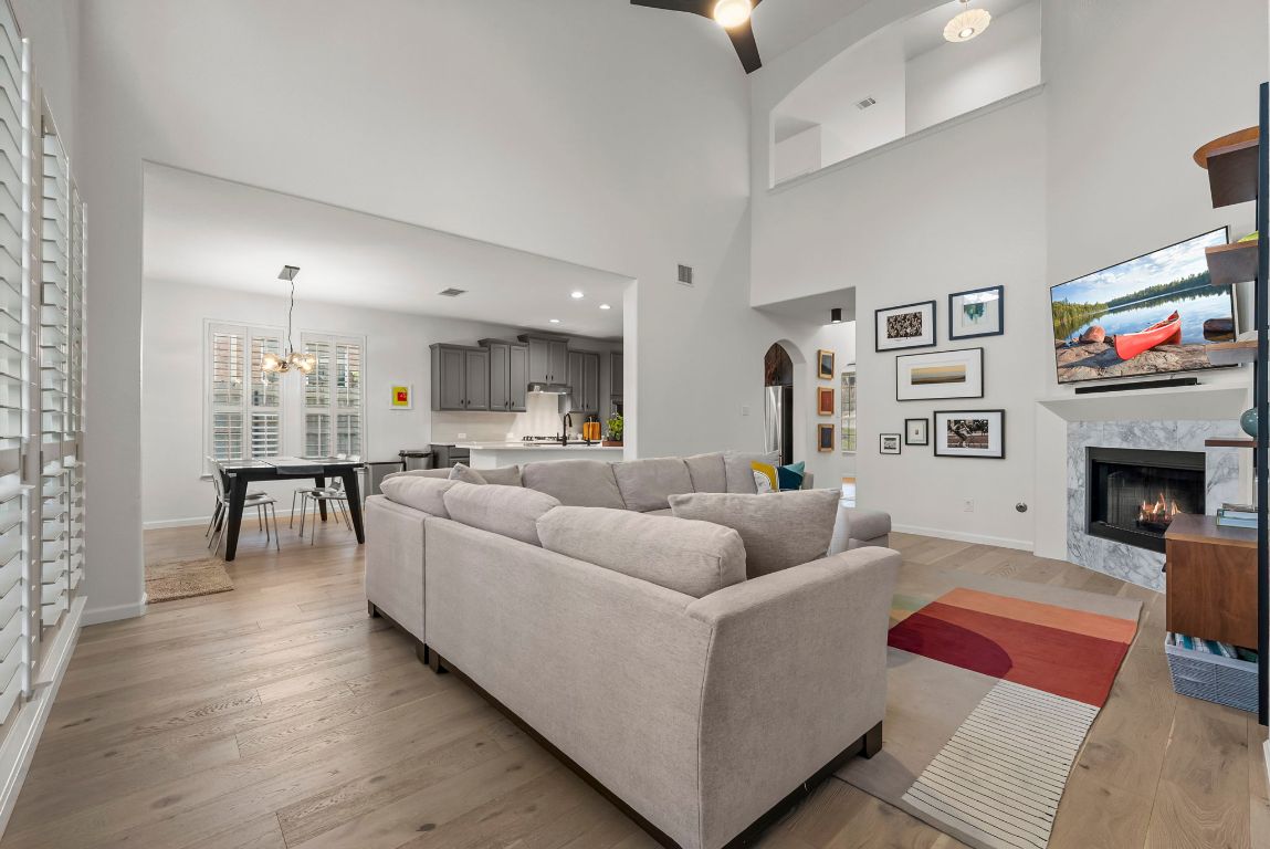 1912 Wildfire Leander, TX 78641 - Photo 12 of 40 a living room with furniture and a fireplace