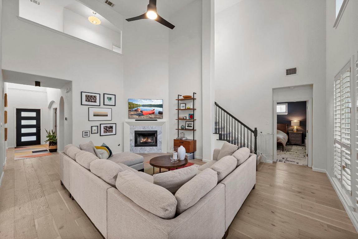 1912 Wildfire Leander, TX 78641 - Photo 13 of 40 a living room with furniture and wooden floor