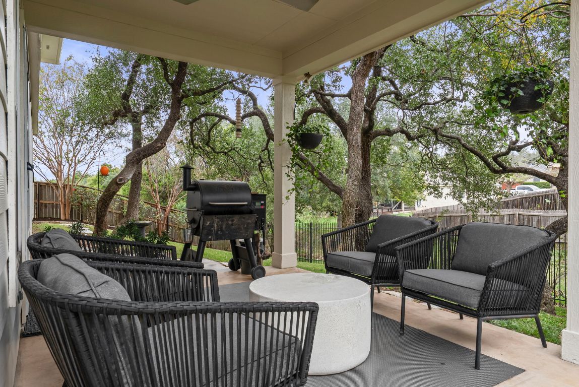 1912 Wildfire Leander, TX 78641 - Photo 30 of 40 a view of a porch with furniture and a fire pit