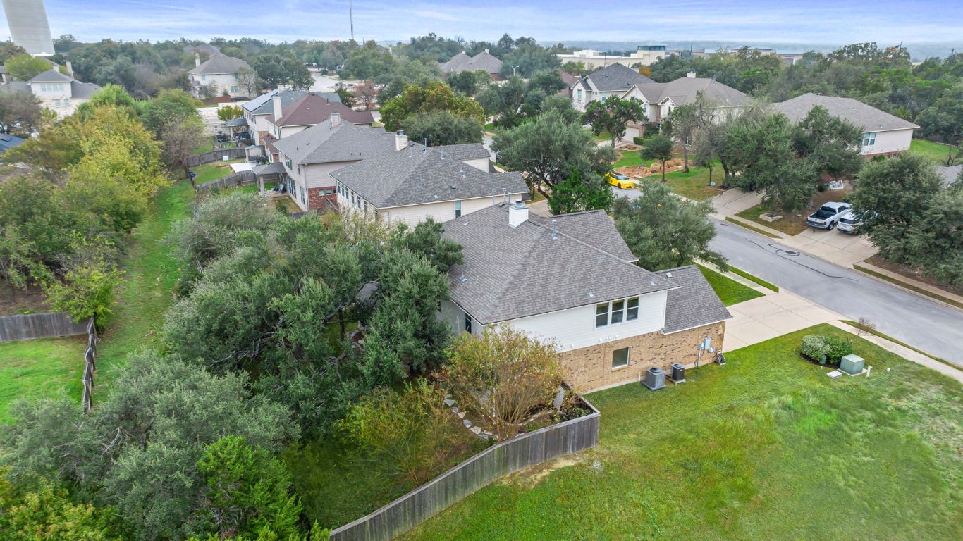 1912 Wildfire Leander, TX 78641 - Photo 37 of 40 an aerial view of residential house with outdoor space and trees all around