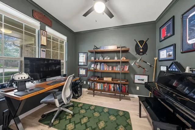 a kitchen with granite countertop a sink a counter top space stainless steel appliances and cabinets