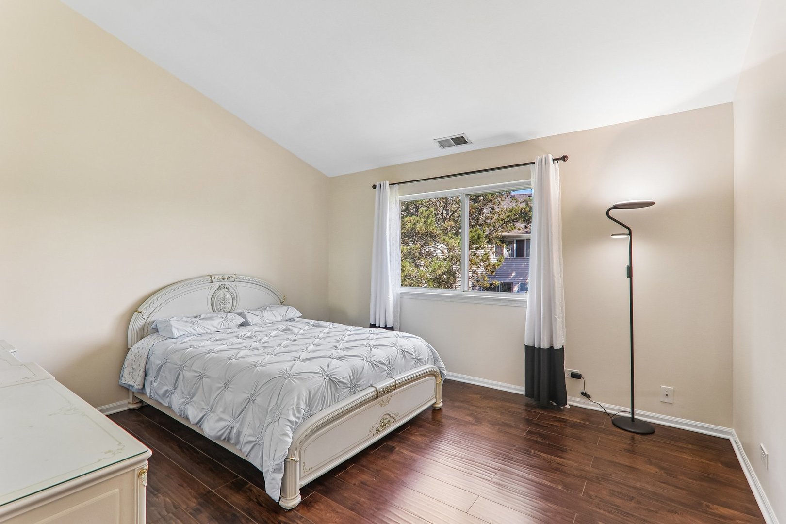 1064 Ripple Ridge Darien, IL 60561 - Photo 10 of 16 a bedroom with a bed and a window