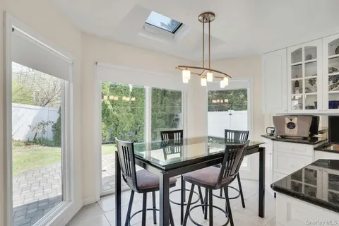 a kitchen with stainless steel appliances a refrigerator and a stove top oven