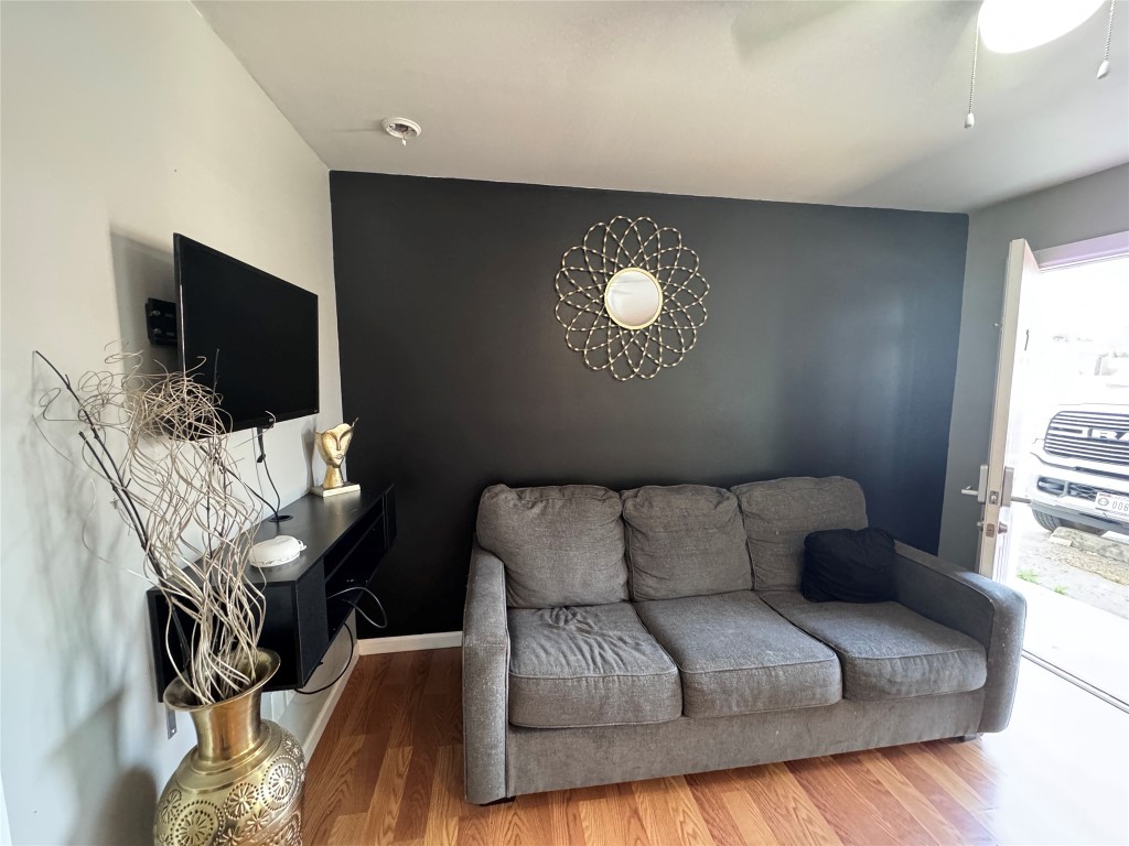 1402 North 2nd Street, Unit 4 Killeen, TX 76541 - Photo 4 of 13 a living room with furniture and a flat screen tv
