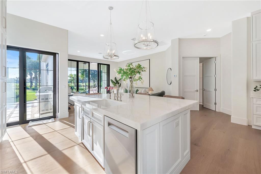 981 Tierra Lago Way Naples, FL 34119 - Photo 16 of 49 a view of a kitchen counter space