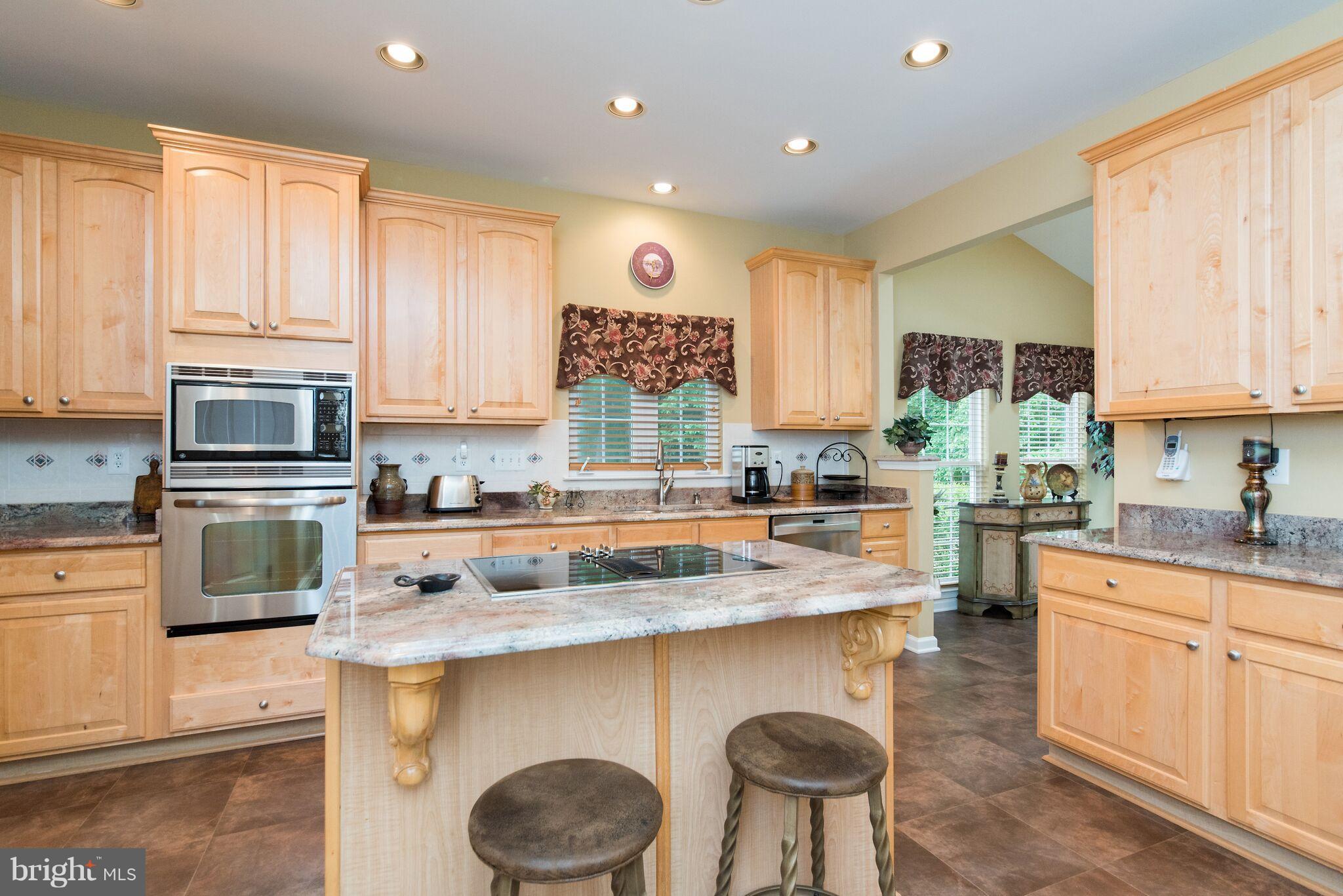 5961 Sandy Ridge Elkridge, MD 21075 - Photo 11 of 30 Island w/ Cook top; Wall Oven Premium Granite