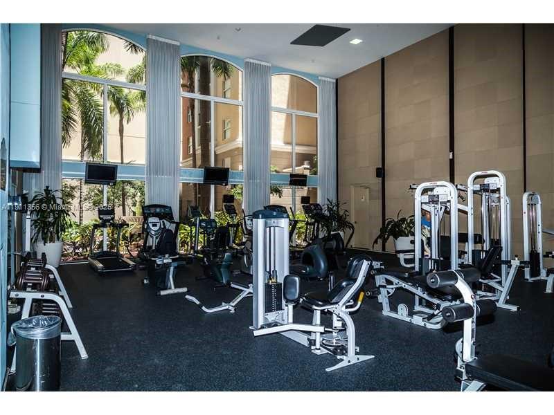 17100 North Bay Road, Unit 1118 Sunny Isles Beach, FL 33160 - Photo 5 of 34 a view of a room with gym equipment