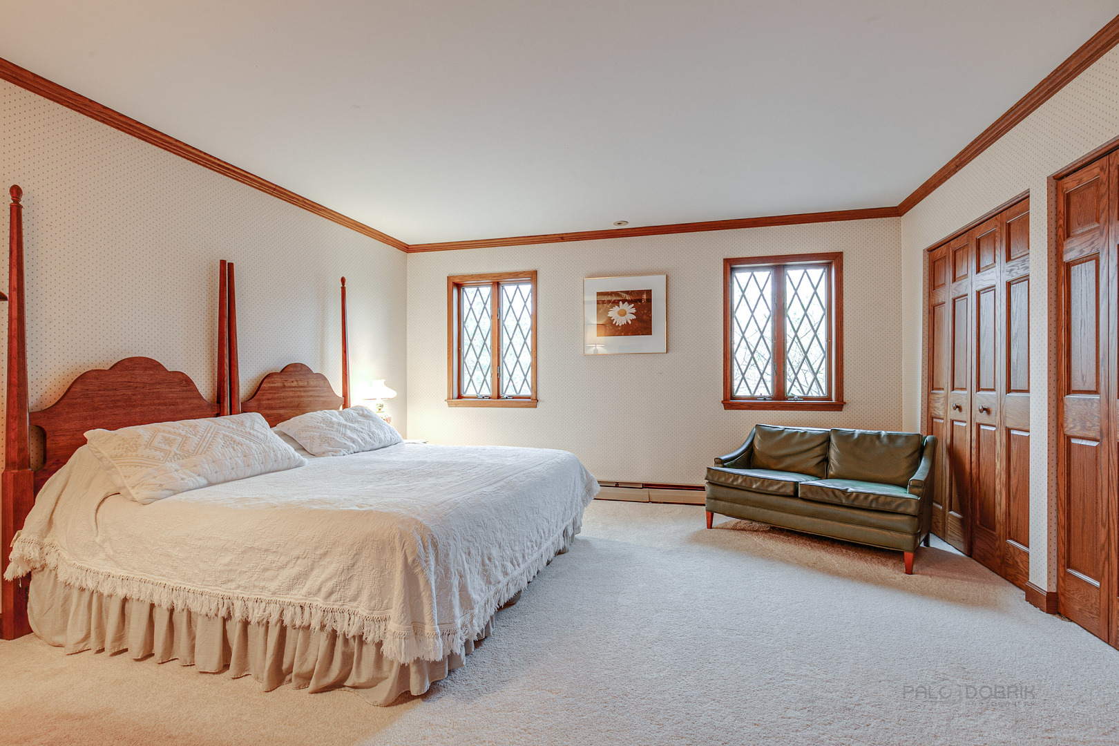889 Willow Road Winnetka, IL 60093 - Photo 14 of 28 a bedroom with a bed and a window