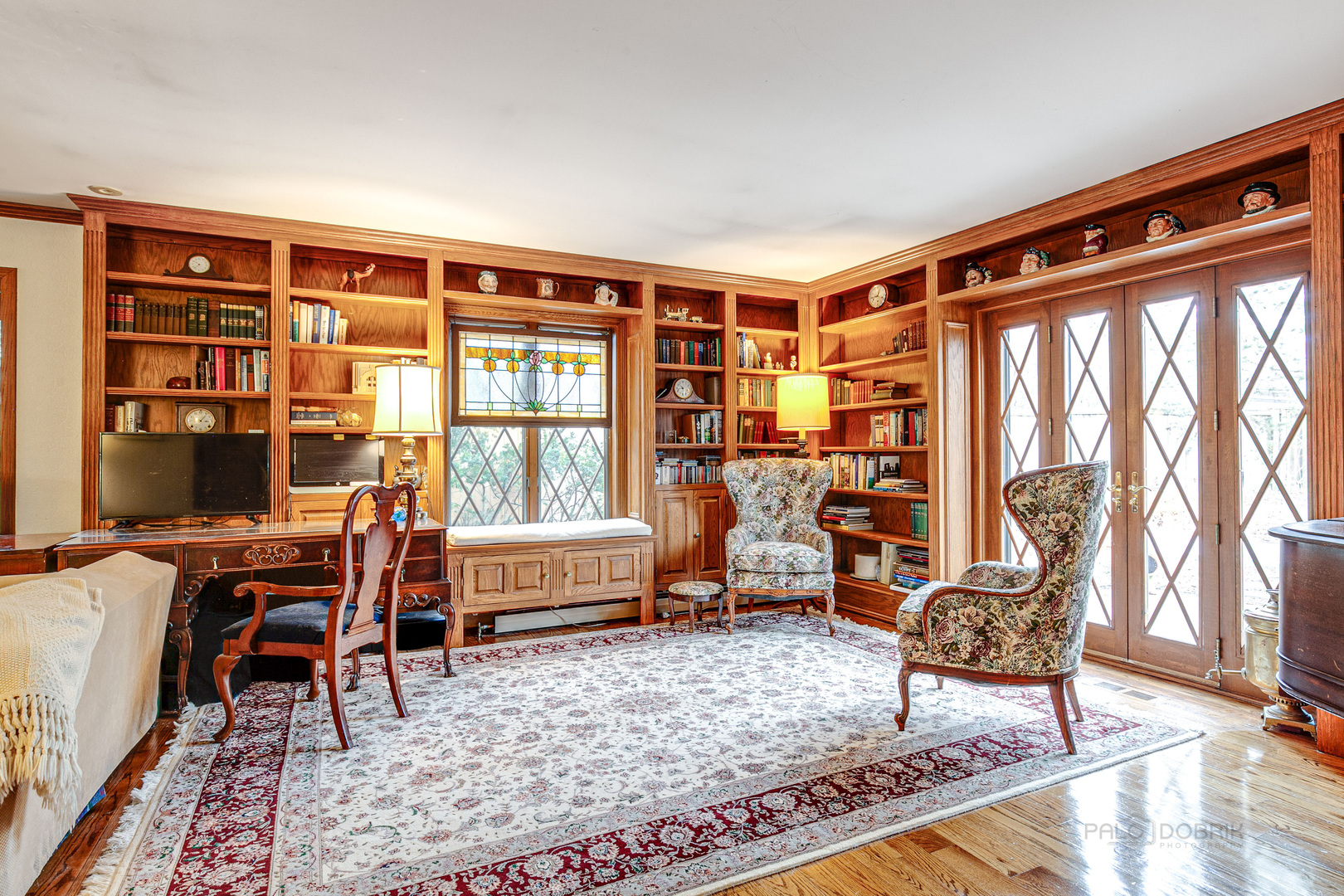 889 Willow Road Winnetka, IL 60093 - Photo 9 of 28 a living room with furniture and a window