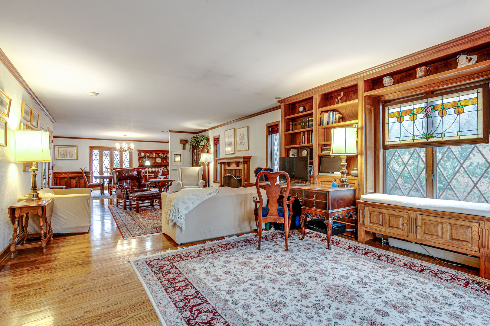 889 Willow Road Winnetka, IL 60093 - Photo 10 of 28 a living room with furniture and a table
