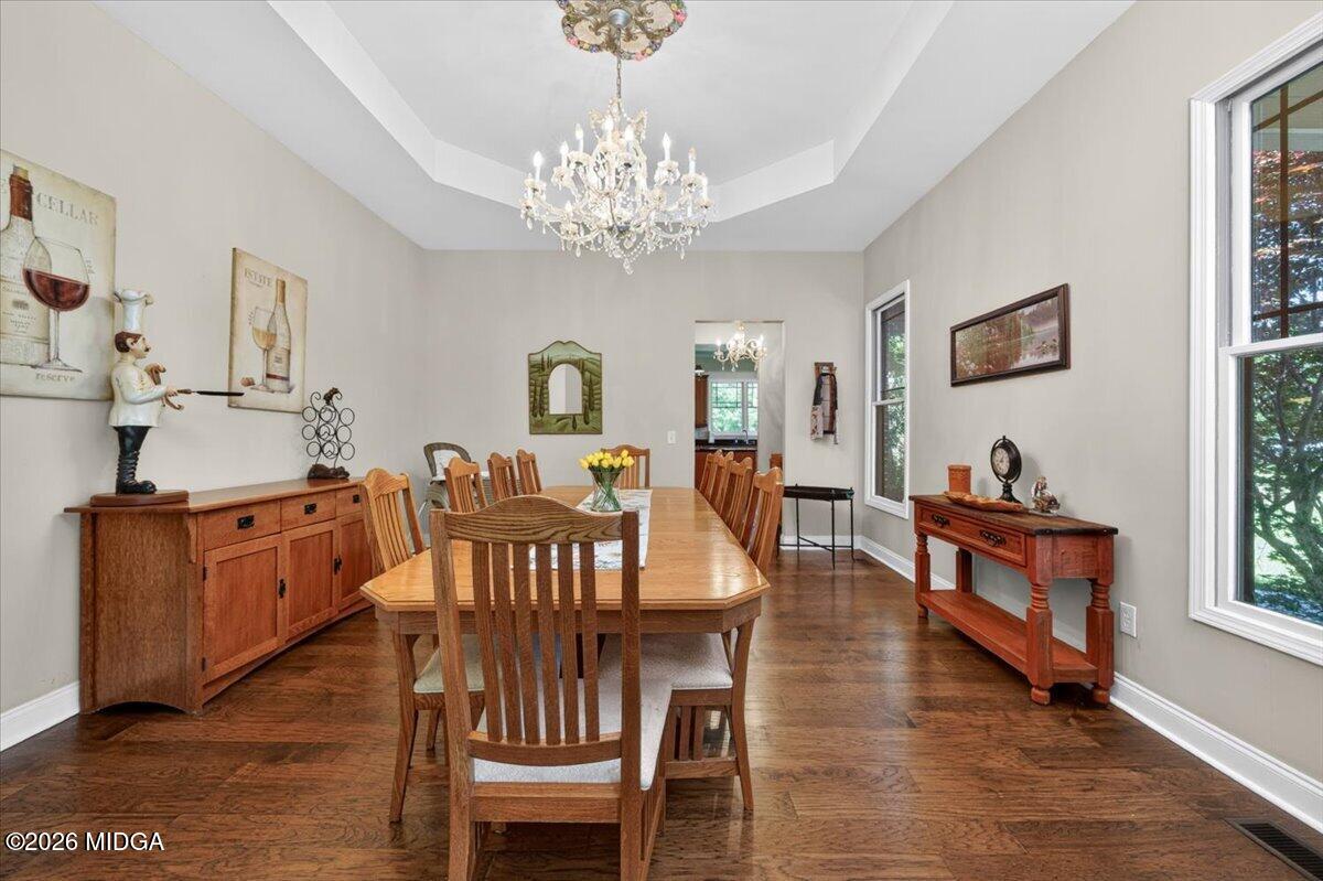 2415 Elko Road Elko, GA 31025 - Photo 16 of 57 a view of a dining room with furniture window and wooden floor