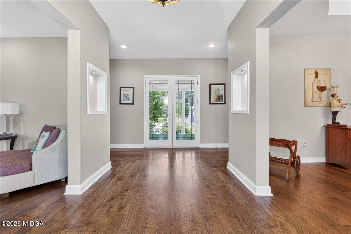 2415 Elko Road Elko, GA 31025 - Photo 18 of 57 a view of a livingroom with furniture hardwood floor and hallway