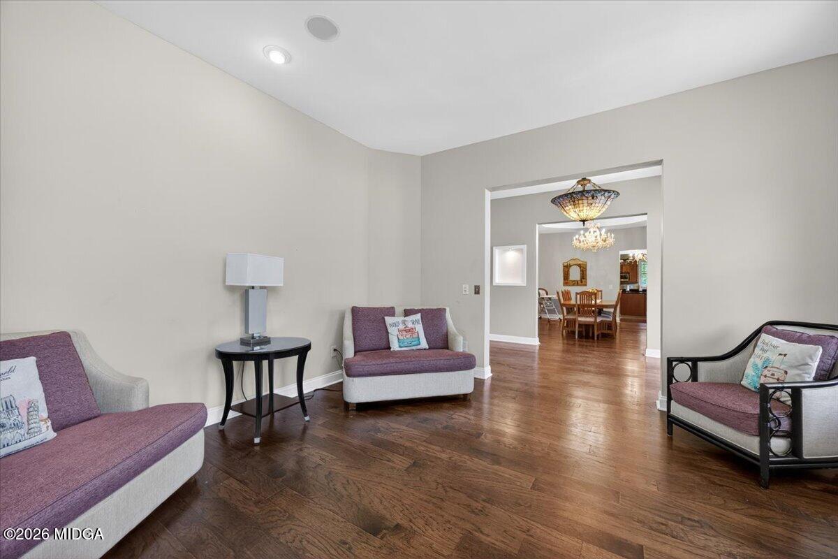 2415 Elko Road Elko, GA 31025 - Photo 20 of 57 a living room with furniture and wooden floor
