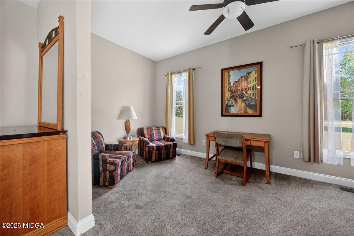 2415 Elko Road Elko, GA 31025 - Photo 23 of 57 a living room with furniture and a window