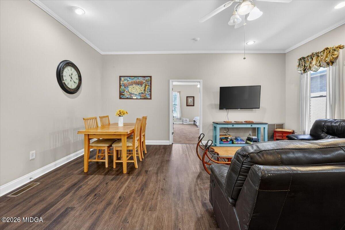 2415 Elko Road Elko, GA 31025 - Photo 37 of 57 a dining room with furniture and a flat screen tv