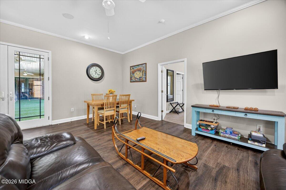 2415 Elko Road Elko, GA 31025 - Photo 39 of 57 a living room with furniture and a flat screen tv