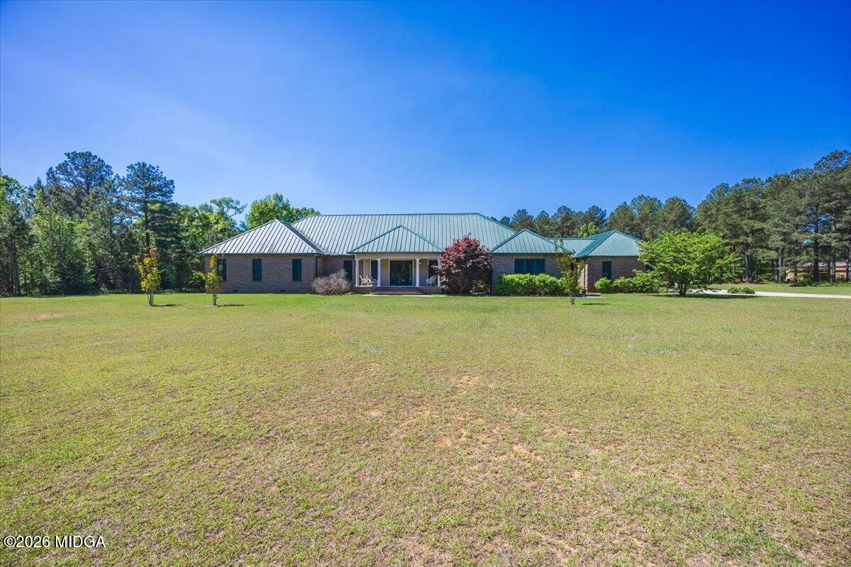 2415 Elko Road Elko, GA 31025 - Photo 57 of 57 a view of a house with yard and outdoor space