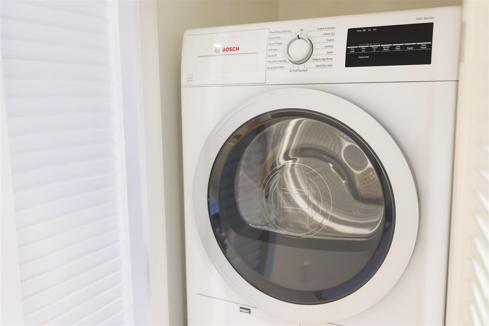 19 Dutch Street, Unit 50H Manhattan, NY 10038 - Photo 3 of 36 a close up view of washer and dryer
