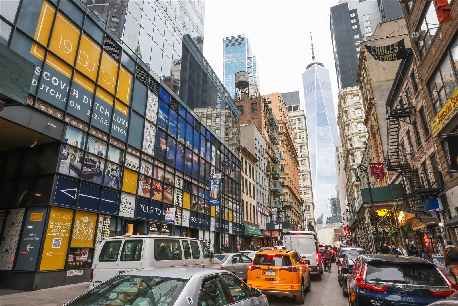 19 Dutch Street, Unit 50H Manhattan, NY 10038 - Photo 5 of 36 a cars parked in front of a building