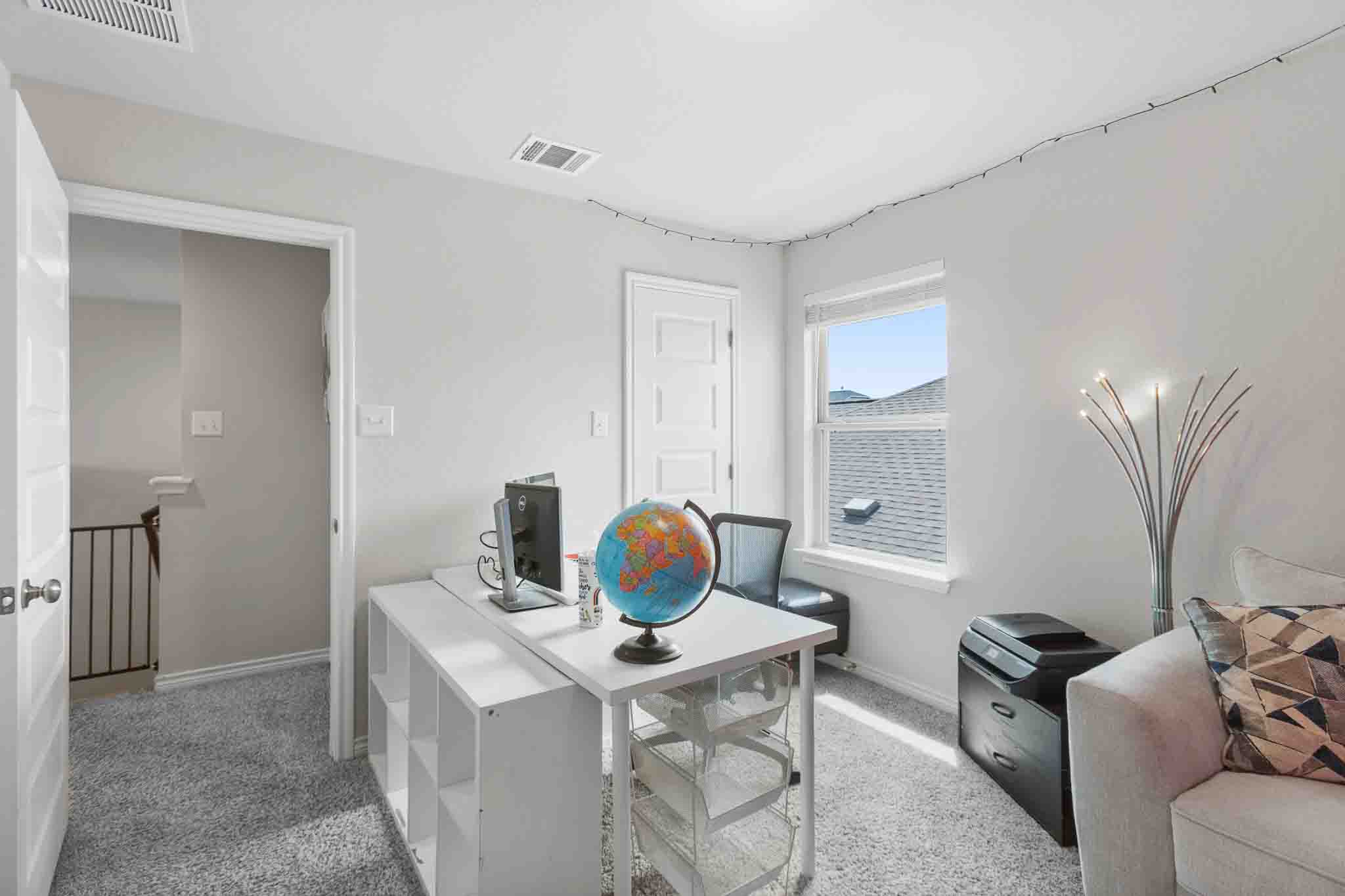 616 Barbary Coast Lane Jarrell, TX 76537 - Photo 27 of 37 a workspace with furniture and window