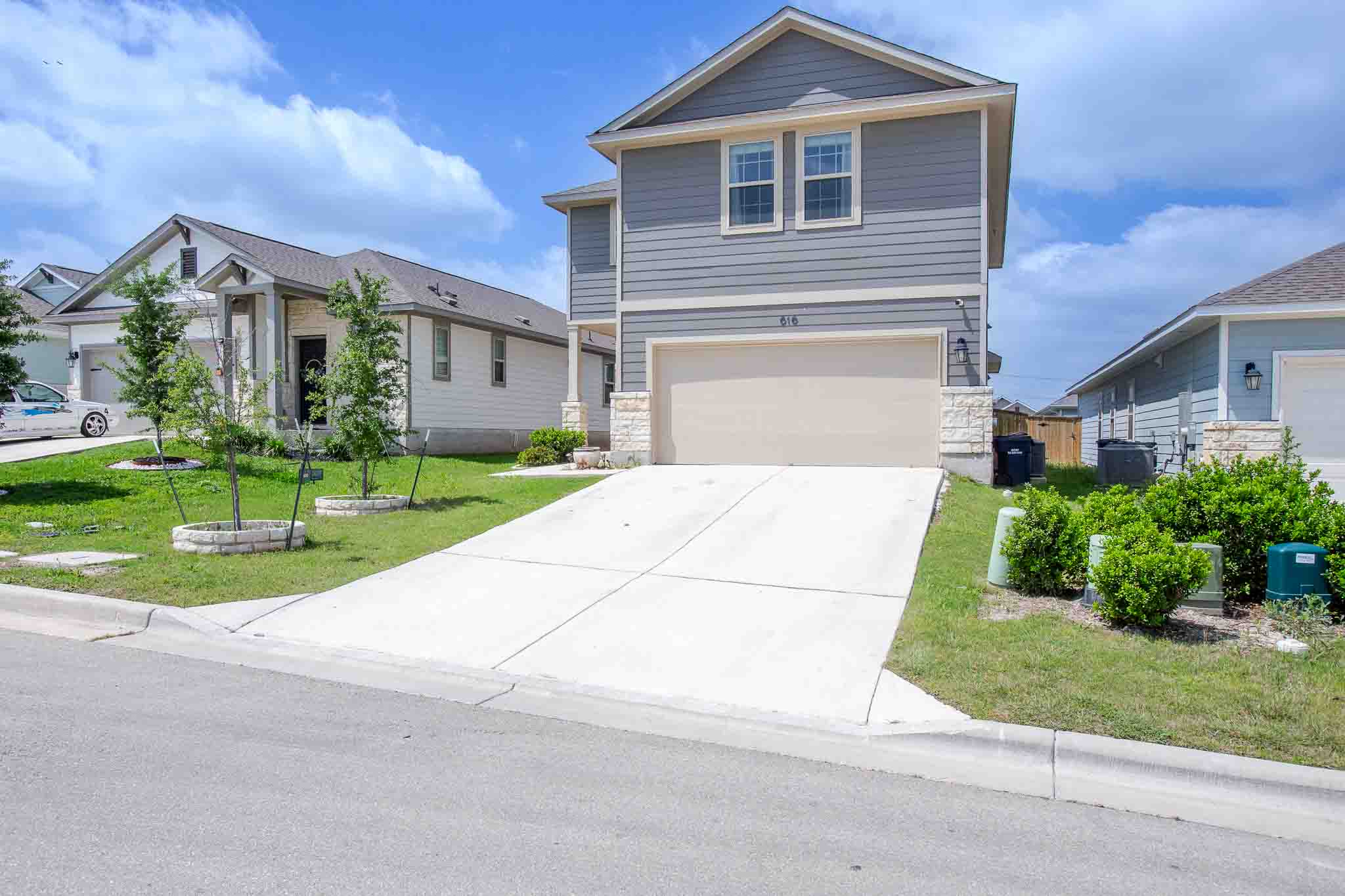 616 Barbary Coast Lane Jarrell, TX 76537 - Photo 3 of 37 a front view of house with yard and green space