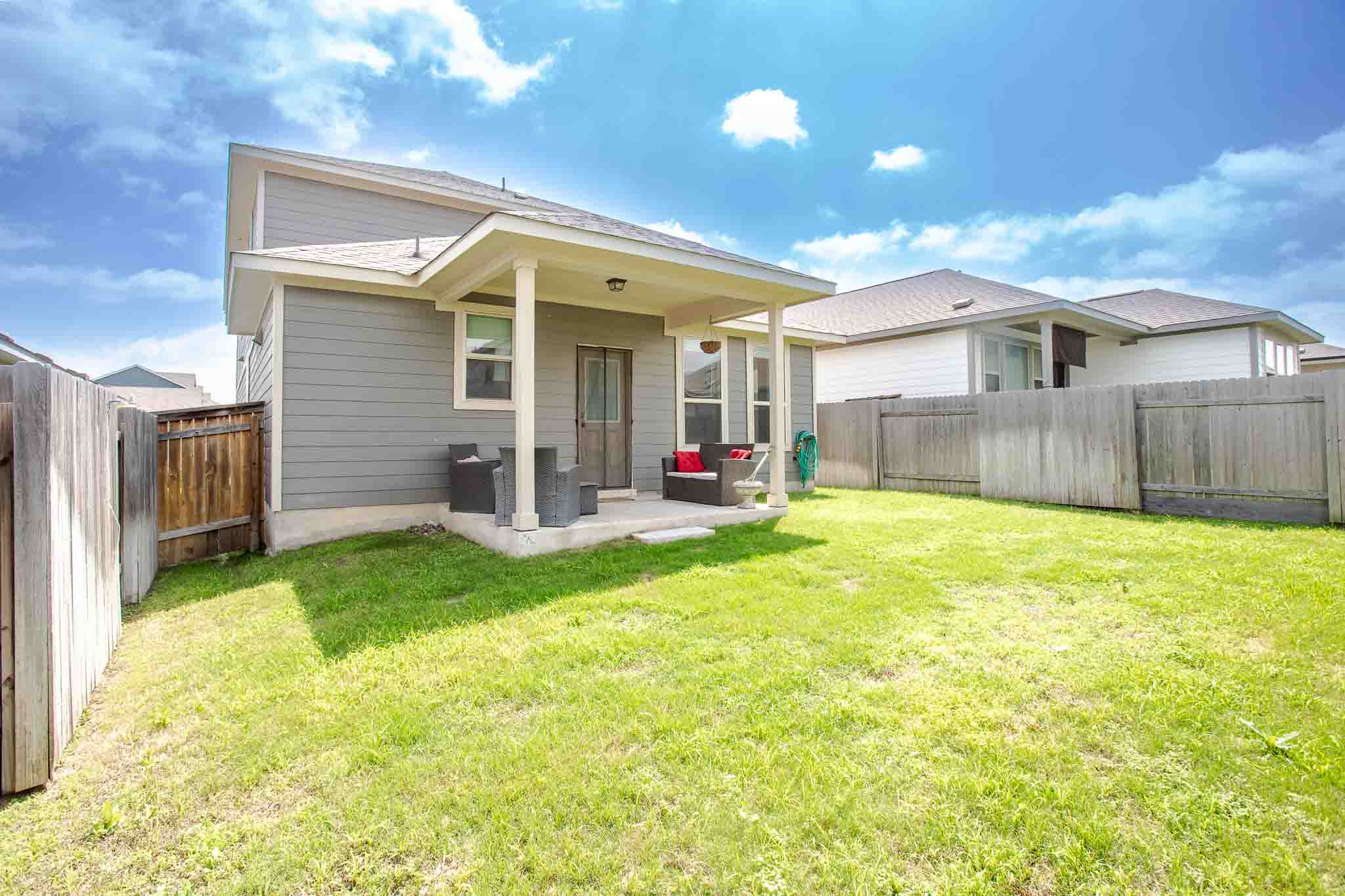 616 Barbary Coast Lane Jarrell, TX 76537 - Photo 36 of 37 a view of a house with a backyard