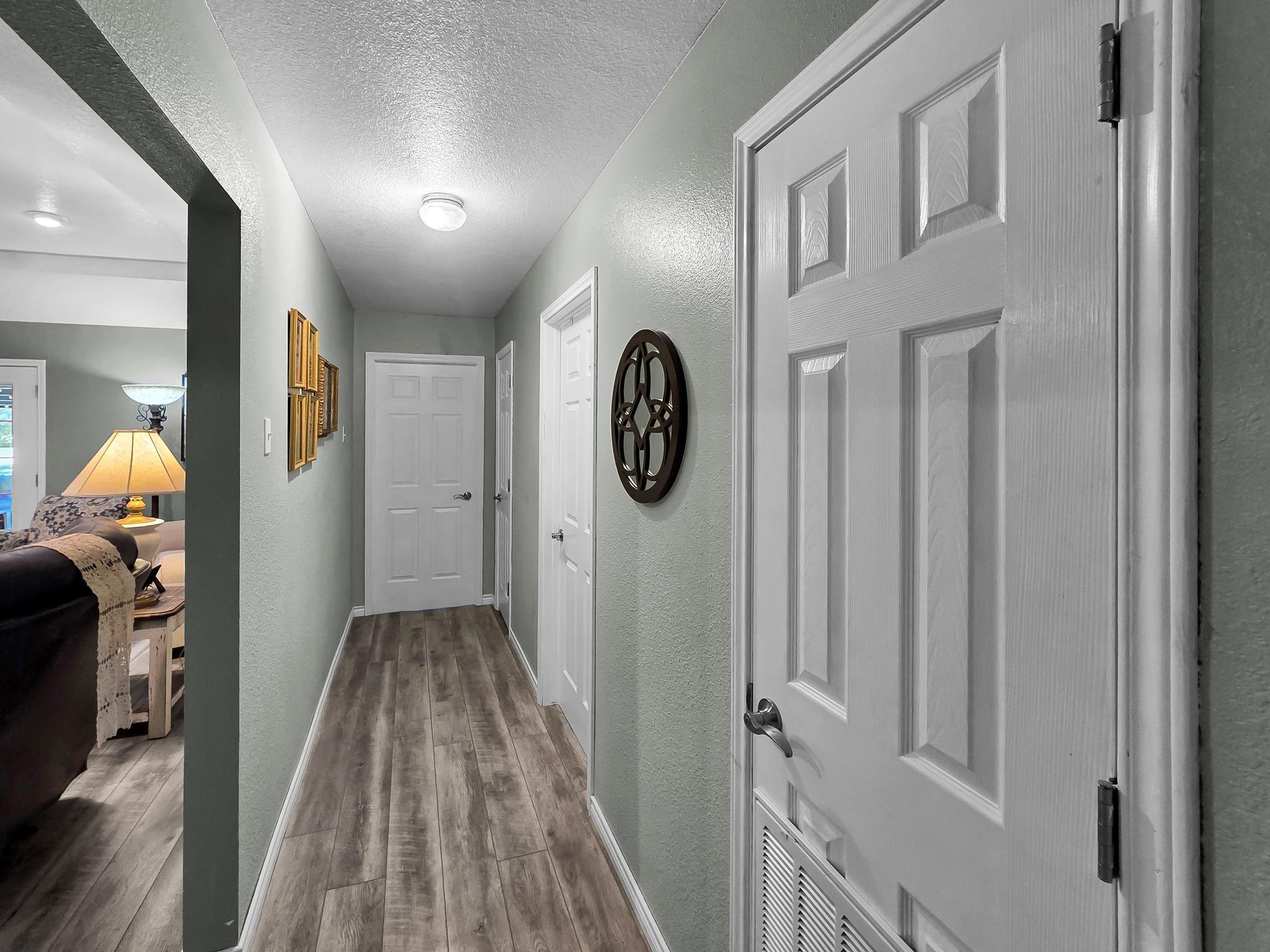 738 Parish Road Orange, TX 77632 - Photo 12 of 45 a view of a hallway to rooms