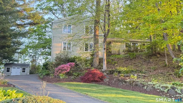 a front view of house with yard