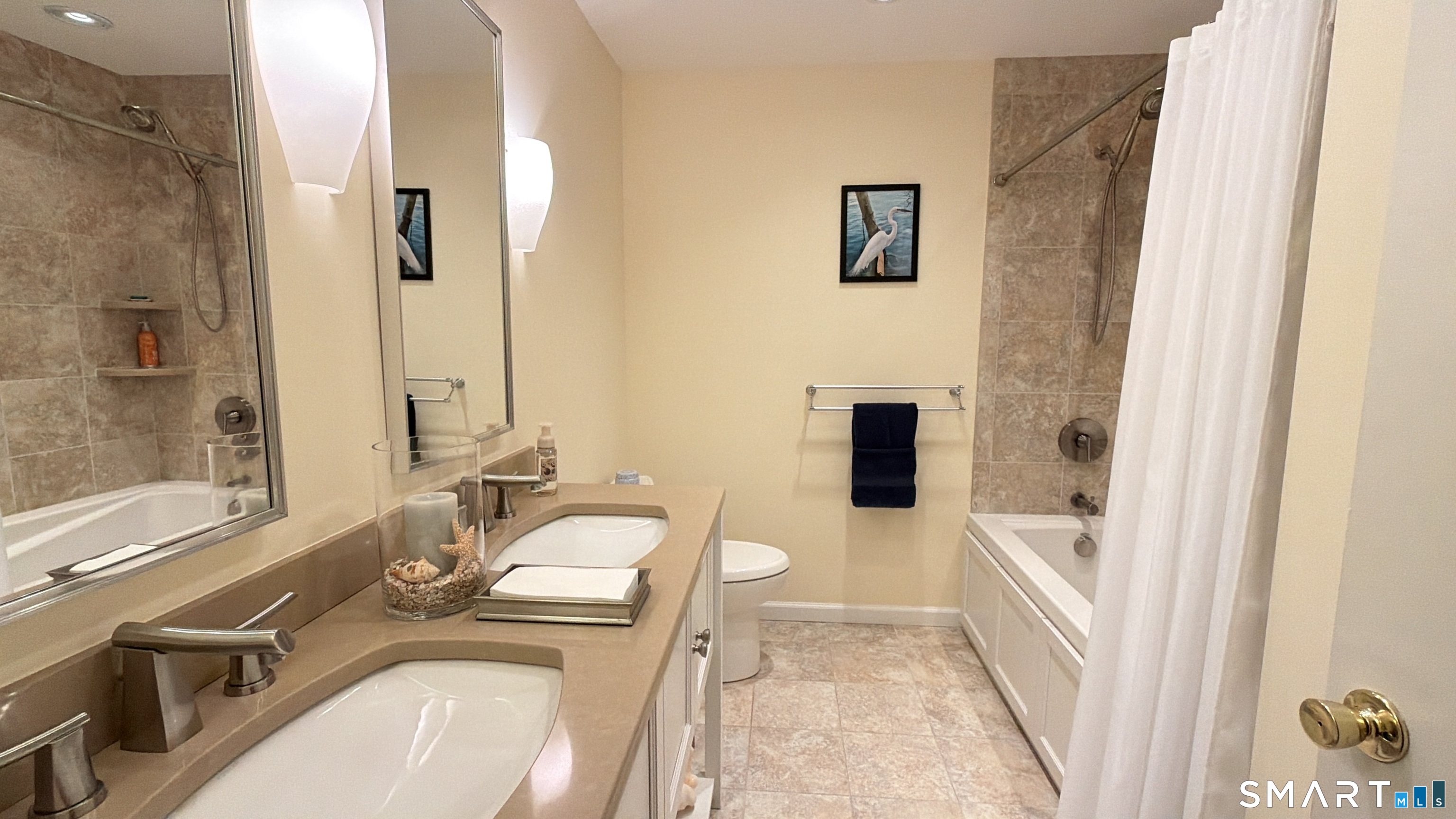 87 Warner Road Berlin, CT 06037 - Photo 19 of 22 a en suite bathroom with a sink a bathtub and a shower