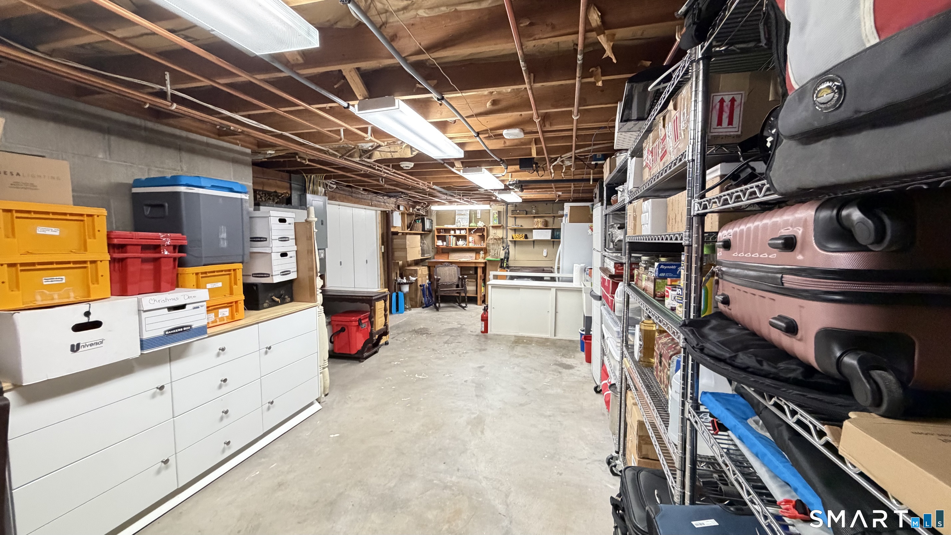 87 Warner Road Berlin, CT 06037 - Photo 20 of 22 a storage room with cabinets
