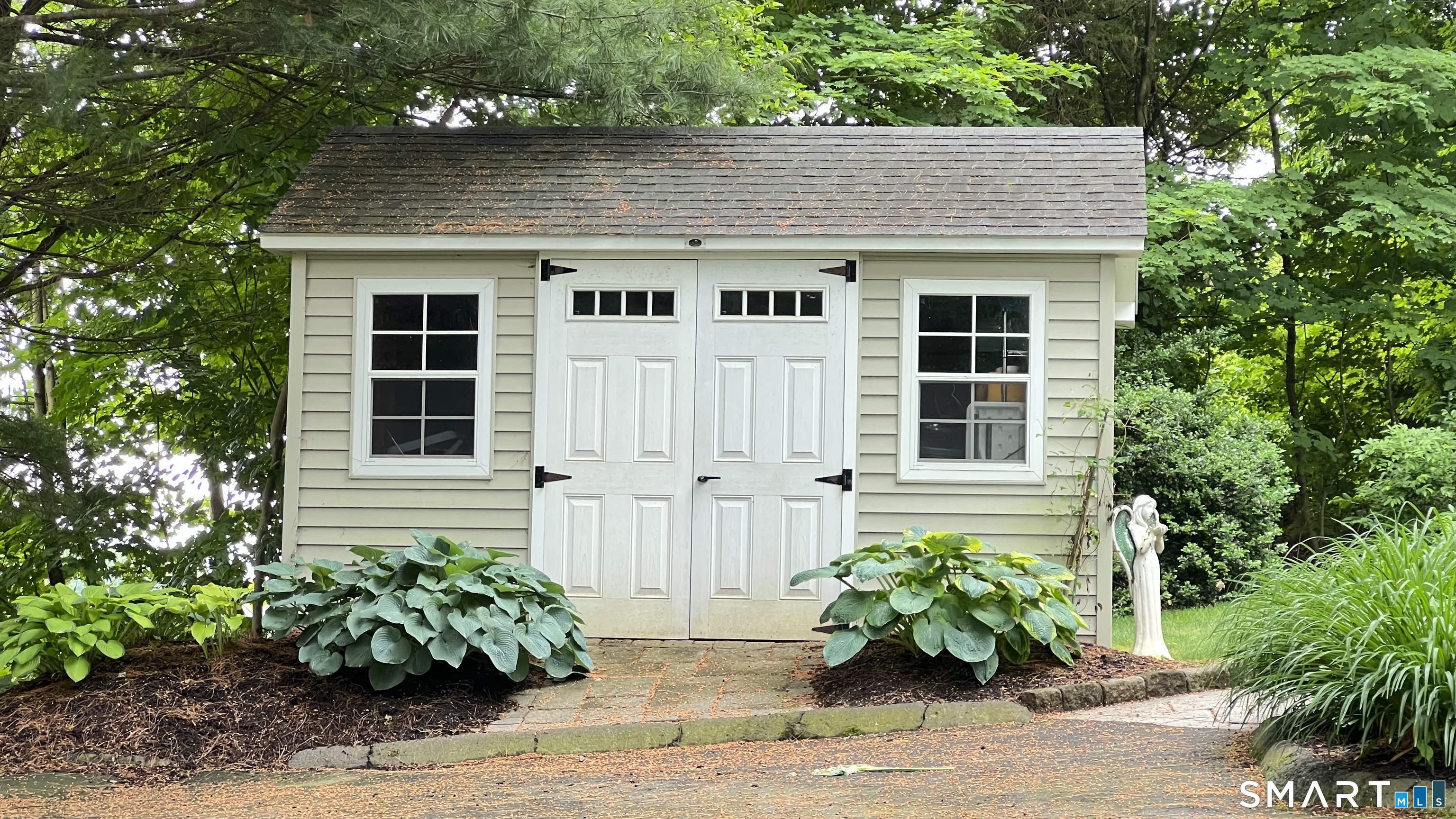 87 Warner Road Berlin, CT 06037 - Photo 22 of 22 a front view of a house with a garden