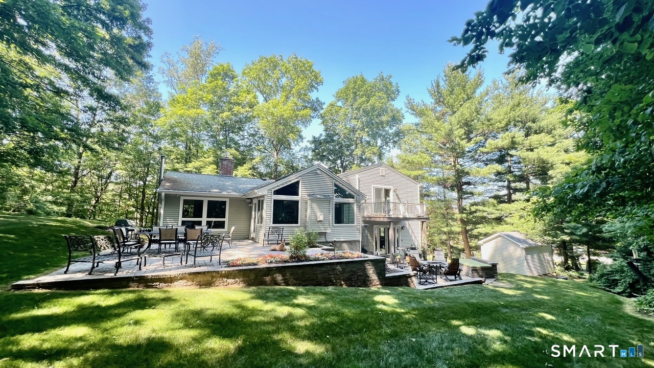 87 Warner Road Berlin, CT 06037 - Photo 4 of 22 a front view of house with yard and outdoor seating