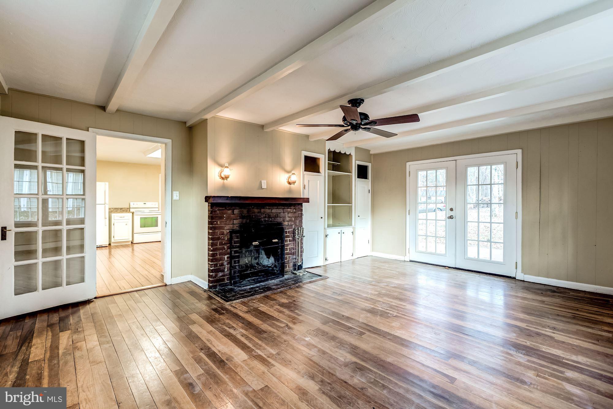 9267 Patrick Street Upperville, VA 20184 - Photo 26 of 43 Family room with fireplace and built ins