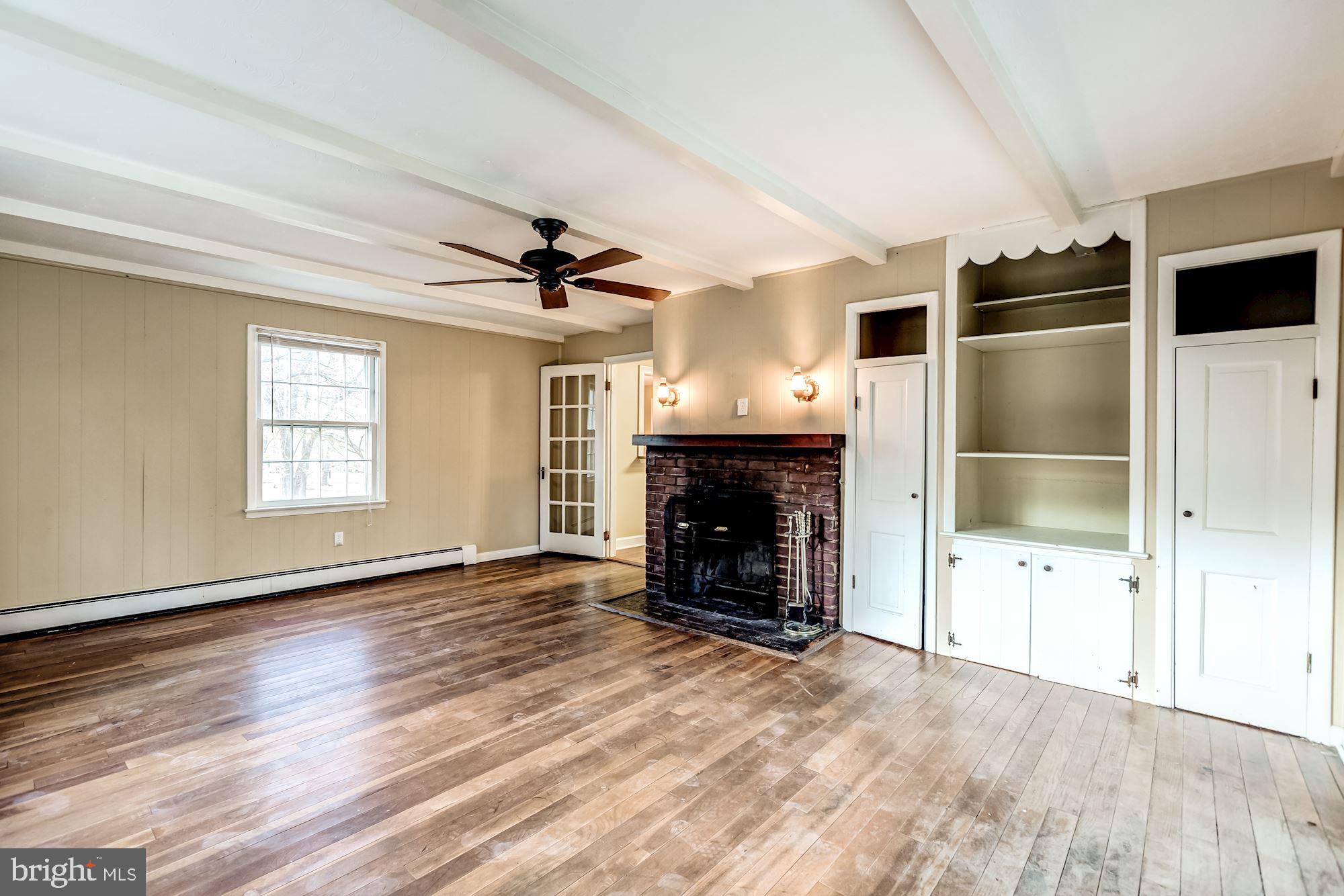 9267 Patrick Street Upperville, VA 20184 - Photo 29 of 43 Family room with built ins and fireplace