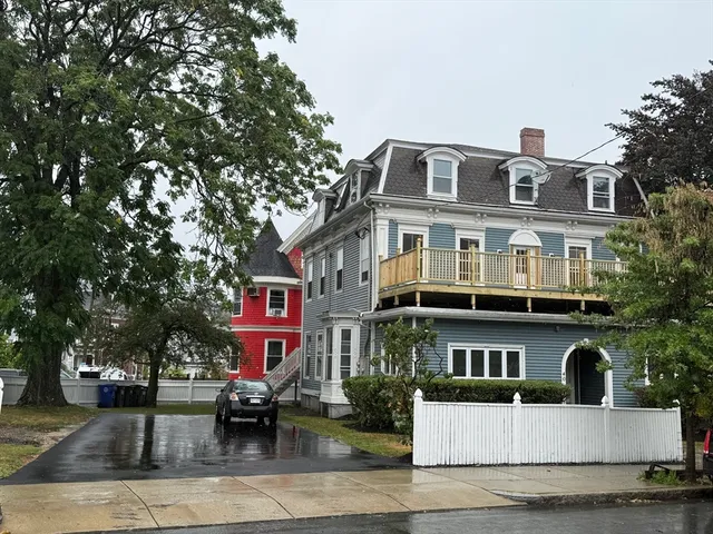 a front view of a building with street view