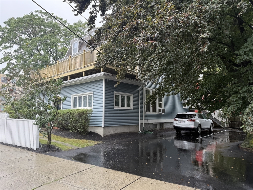 40 Crescent Chelsea Ma, Unit 2 Chelsea, MA 02150 - Photo 13 of 20 a front view of a house with a garden