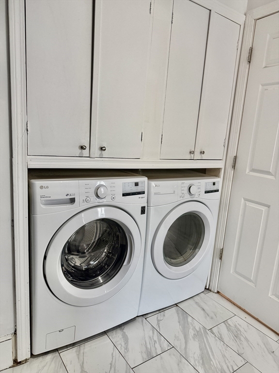 40 Crescent Chelsea Ma, Unit 2 Chelsea, MA 02150 - Photo 16 of 20 a utility room with dryer and washer
