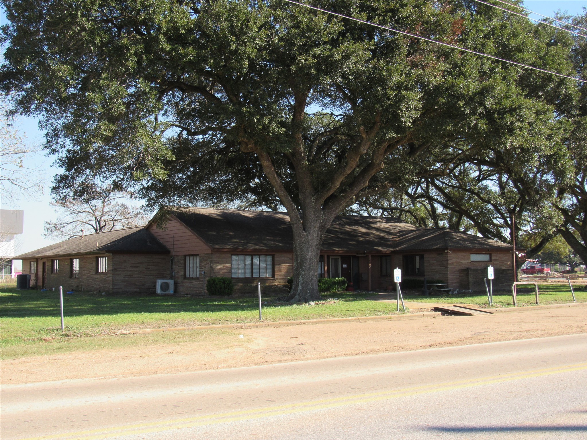 a house with trees in the background