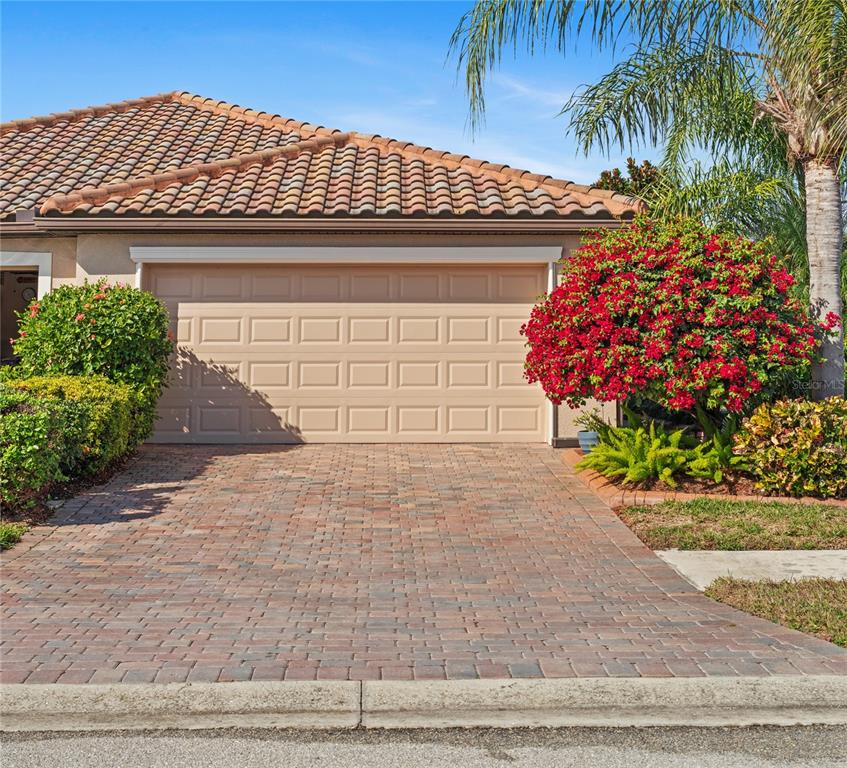 20219 Tesoro Drive Venice, FL 34293 - Photo 1 of 98 a front view of a house