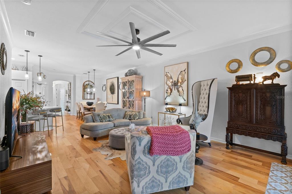 20219 Tesoro Drive Venice, FL 34293 - Photo 28 of 98 a living room with patio furniture and wooden floor