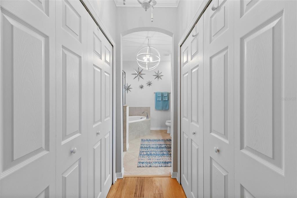 20219 Tesoro Drive Venice, FL 34293 - Photo 36 of 98 a view of a hallway with wooden floor and entryway