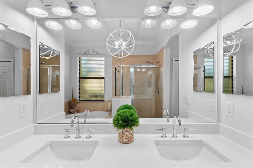 20219 Tesoro Drive Venice, FL 34293 - Photo 40 of 98 a bathroom with a sink and a mirror