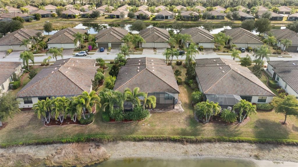 20219 Tesoro Drive Venice, FL 34293 - Photo 61 of 98 an aerial view of residential houses with outdoor space
