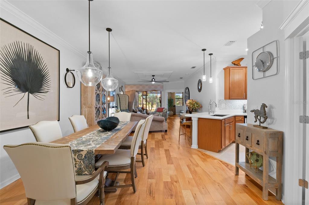 20219 Tesoro Drive Venice, FL 34293 - Photo 7 of 98 a view of a dining room with furniture window and wooden floor