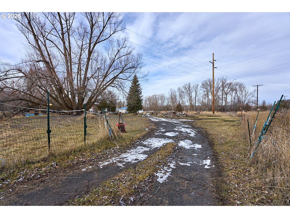82695 Fish Hatchery Lane Enterprise, OR 97828 - Photo 4 of 12 a view of a yard with swimming pool