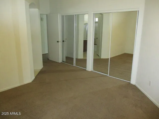 a bathroom with a shower and a sink