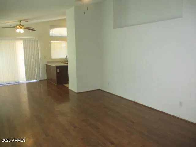 a view of a livingroom with a kitchen