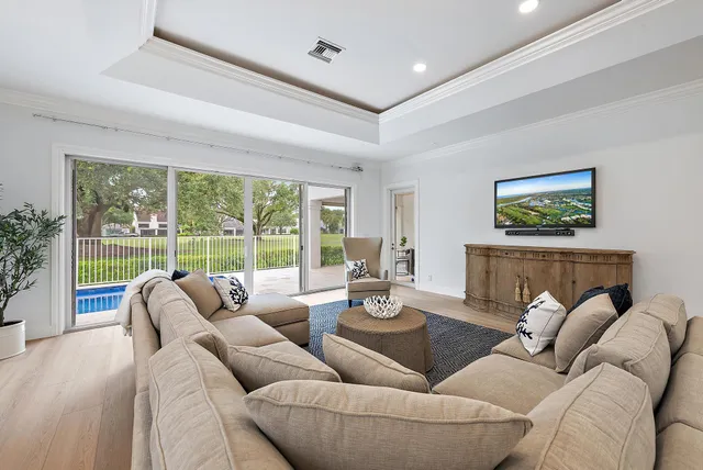 a kitchen with stainless steel appliances granite countertop a stove and a refrigerator