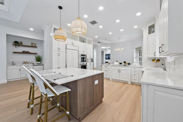 a kitchen with a table and chair